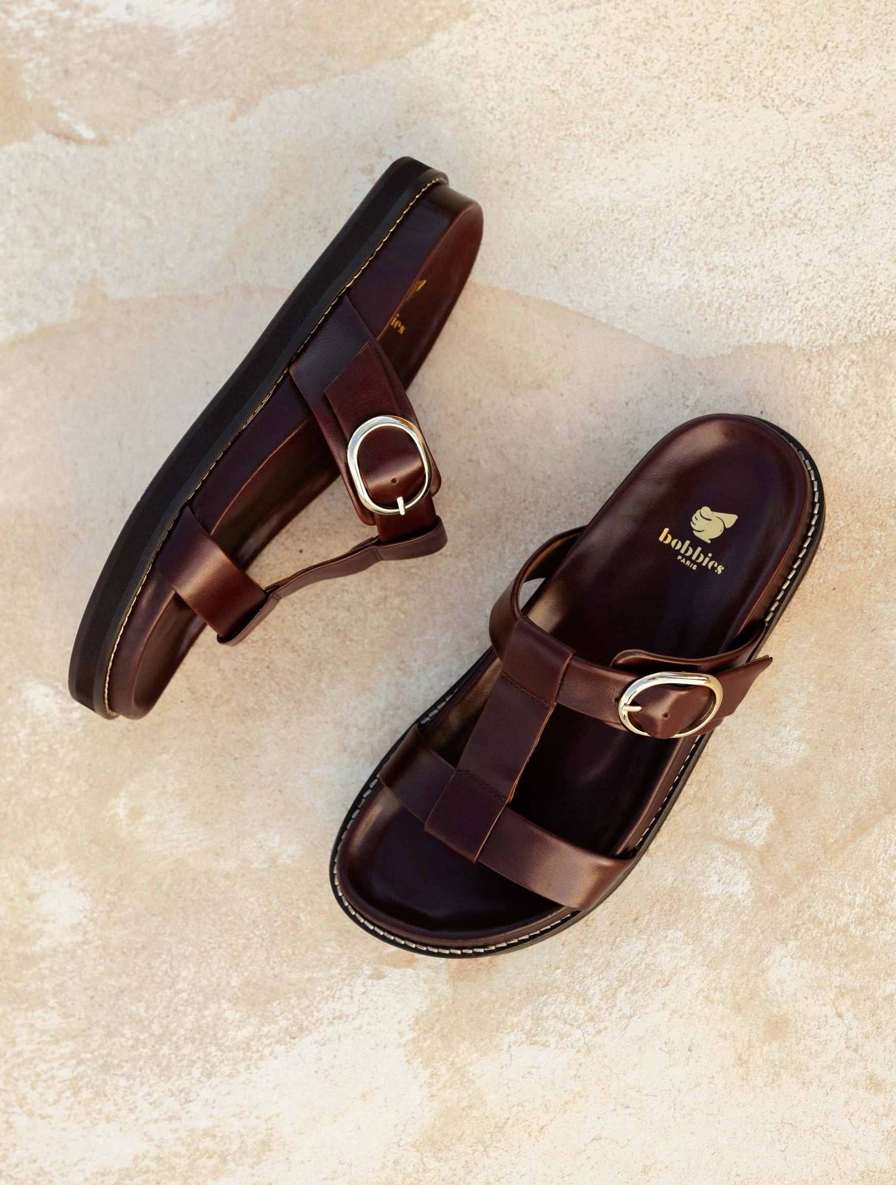 FAJAR — Sandales plates en cuir